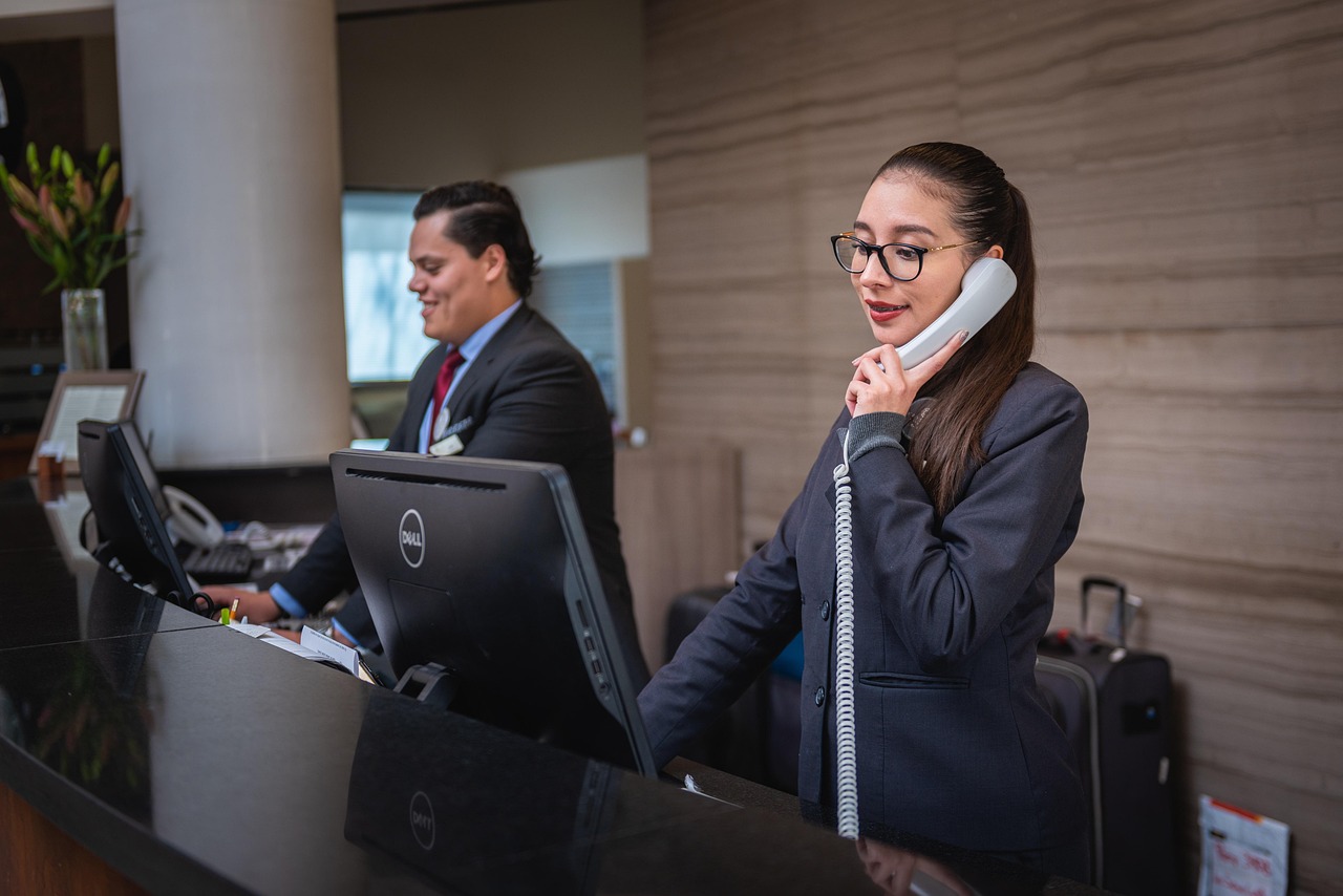 About receptionists, phone call, hotel, reception, woman, man, work, attention, lobby, employees, professional, company, assistance, hotel, hotel, hotel, hotel, hotel, reception